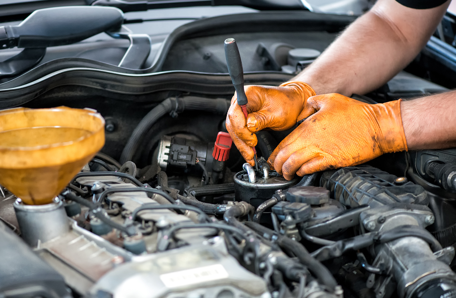 mechanic repairing diesel engine in Phoenix