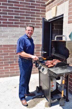 Steve Peterson barbecuing