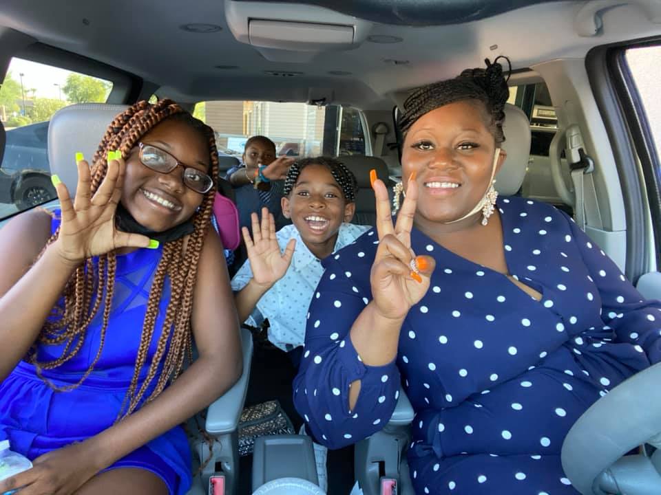 family in car