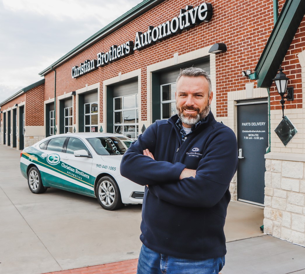 CBAC car in front of shop